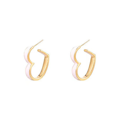 White Enamel and 18K Gold-Plated Heart Huggie Earrings, gold huggie earrings, botanical inspired, side view