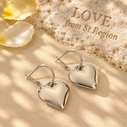 Silver-Plated Heart Huggie Earrings, silver huggie earrings, elegant gift for her, lifestyle look