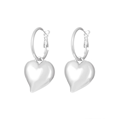 Silver-Plated Heart Huggie Earrings, silver huggie earrings, elegant gift for her, side view