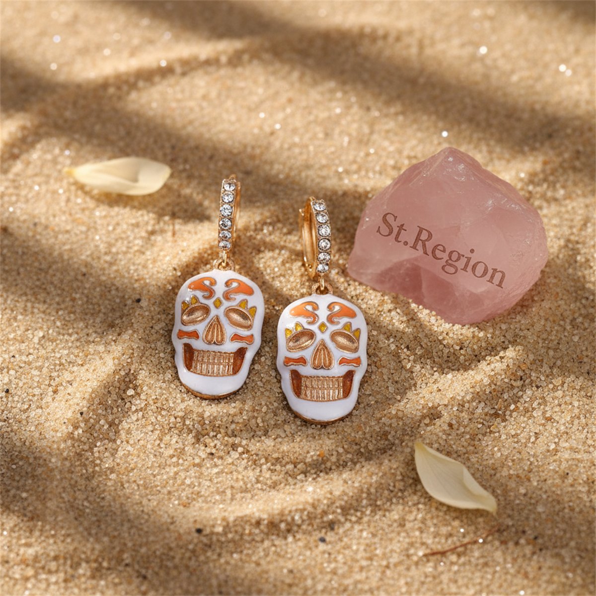 Cubic Zirconia and Enamel 18K Gold-Plated Skull Huggie Earrings, gold huggie earrings, botanical inspired, detail close-up