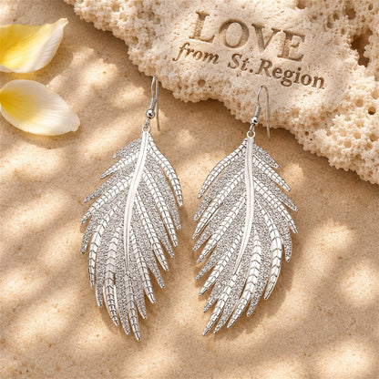 Silver-Plated Feather Drop Earrings, silver drop earrings for women, dainty minimalist design, lifestyle look