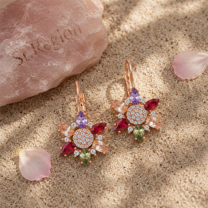 Red Cubic Zirconia and 18K Rose Gold-Plated Flower Huggie Earrings, rose gold huggie earrings, detail close-up