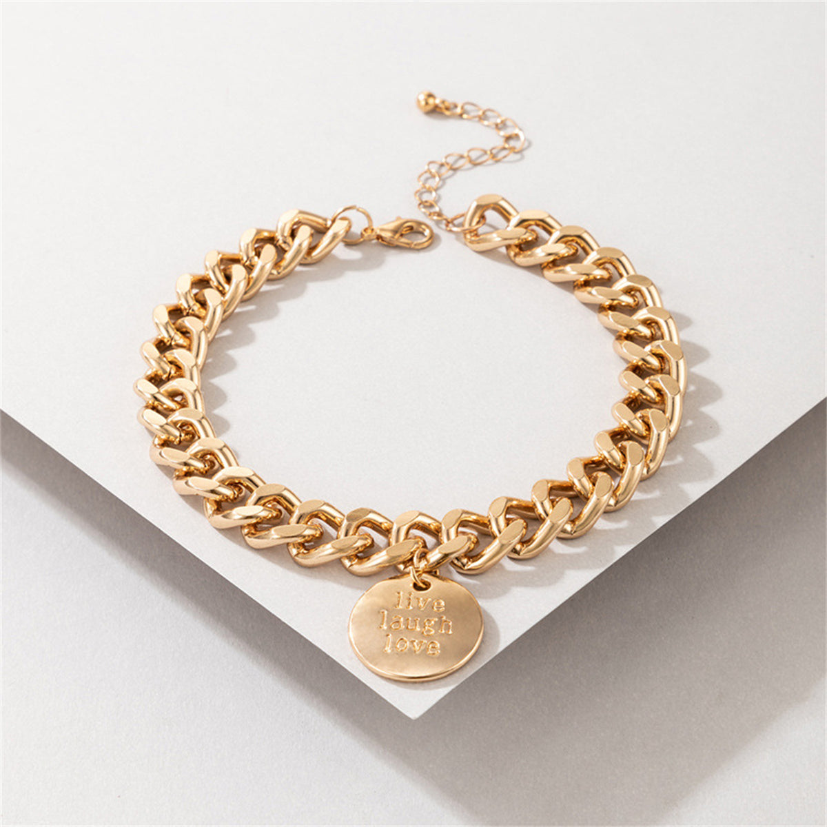 Chic 18K gold-plated anklet with a bold curb chain and a lovely coin charm, perfect for elevating your accessory game.