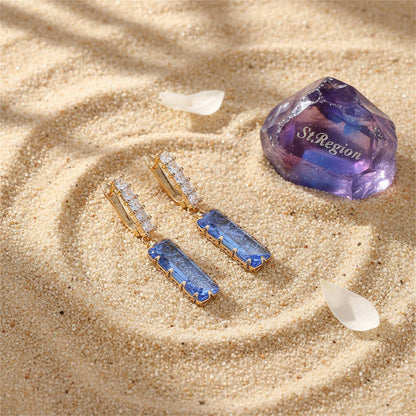Light Blue Crystal and 18K Gold-Plated Baguette Huggie Earrings, gold huggie earrings, everyday style, detail close-up