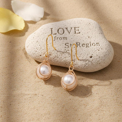 Pearl and Goldtone Textured Cage Hook Earrings, gold drop earrings for women, vintage-inspired design, lifestyle look