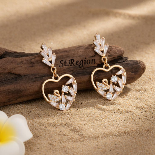 Cubic Zirconia and Goldtone Swan Heart Dangle Earrings, gold drop earrings for women, vintage-inspired design, front view