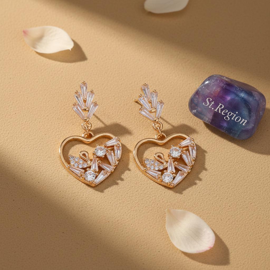 Cubic Zirconia and Goldtone Swan Heart Dangle Earrings, gold drop earrings for women, detail close-up