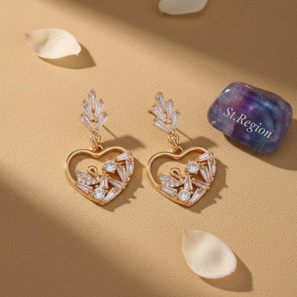 Cubic Zirconia and Goldtone Swan Heart Dangle Earrings, gold drop earrings for women, detail close-up
