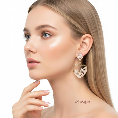 Cubic Zirconia and Goldtone Swan Heart Dangle Earrings, gold drop earrings for women, vintage-inspired design, styled look