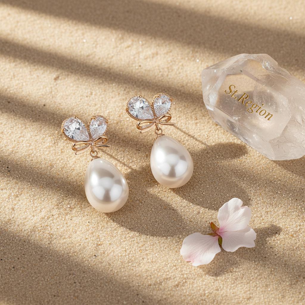 Pear Crystal and Pearl Goldtone Butterfly Drop Earrings, gold drop earrings for women, detail close-up