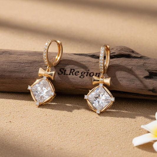 gold tone floral drop earrings St.Region