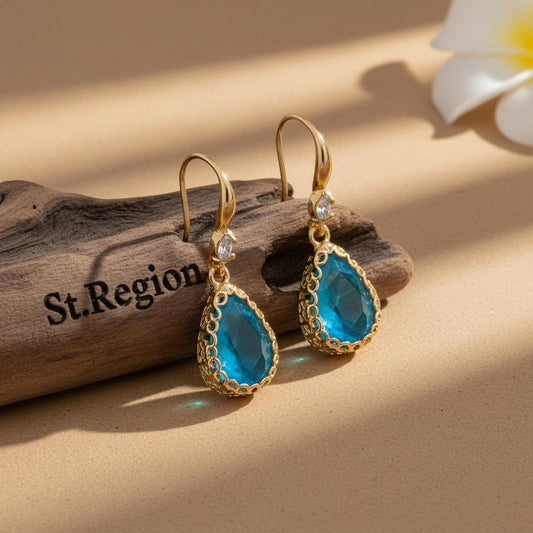 gold tone floral drop earrings St.Region