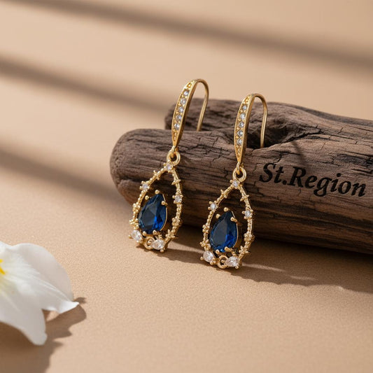 gold tone floral drop earrings St.Region