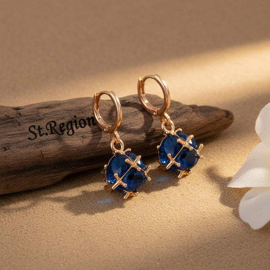 gold tone floral drop earrings St.Region