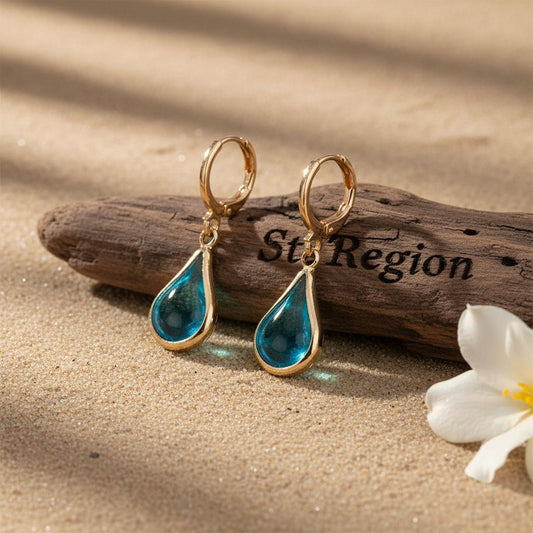 Blue Glass and Goldtone Drop Shape Huggie Earrings, gold drop earrings for women, vintage-inspired design, front view
