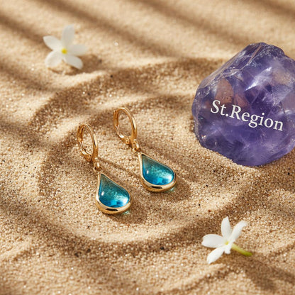 Blue Glass and Goldtone Drop Shape Huggie Earrings, gold drop earrings for women, vintage-inspired design, detail close-up
