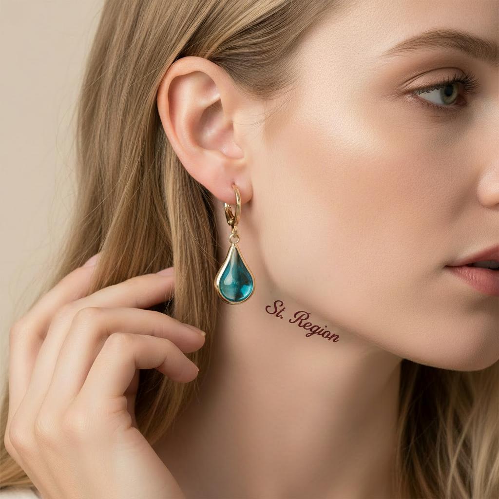 Blue Glass and Goldtone Drop Shape Huggie Earrings, gold drop earrings for women, vintage-inspired design, styled look