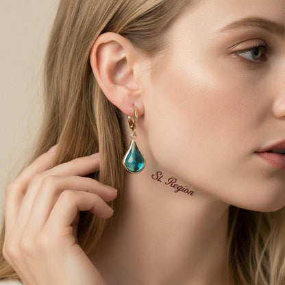 Blue Glass and Goldtone Drop Shape Huggie Earrings, gold drop earrings for women, vintage-inspired design, styled look