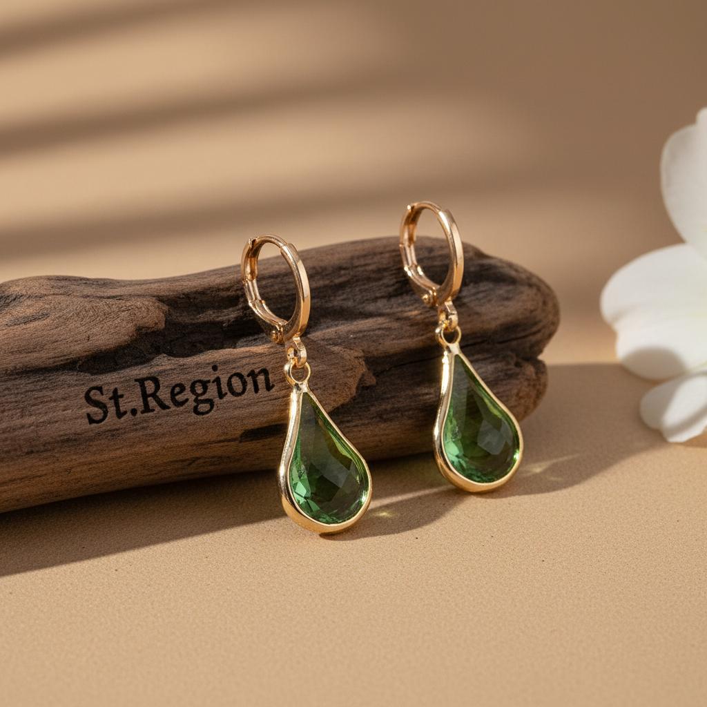 Green Glass and Goldtone Drop Shape Huggie Earrings, gold drop earrings for women, botanical inspired, front view