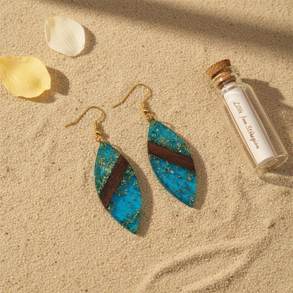 Blue Resin and Wood Goldtone Leaf Hook Earrings, gold drop earrings for women, vintage-inspired design, lifestyle look