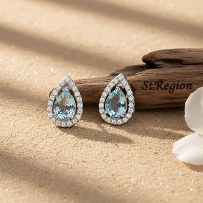 Blue Topaz and Cubic Zirconia Silvertone Hola Drop Huggie Earrings, silver huggie earrings, elegant gift for her, front view