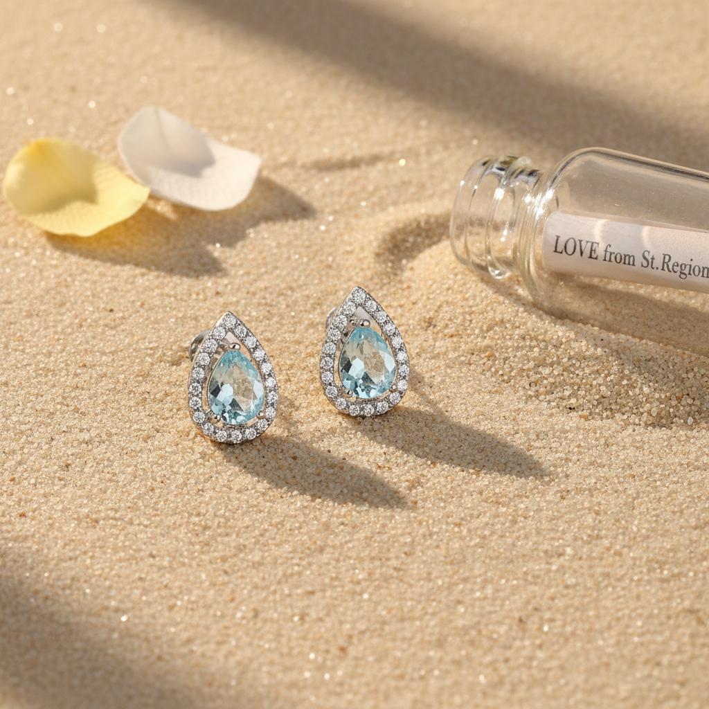 Blue Topaz and Cubic Zirconia Silvertone Hola Drop Huggie Earrings, silver huggie earrings, lifestyle look
