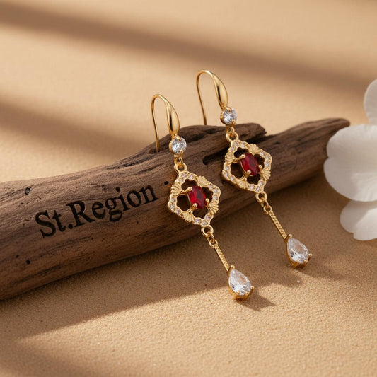gold tone floral drop earrings St.Region