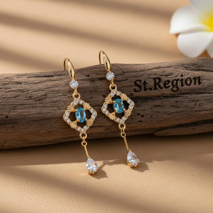 Sea Blue Crystal and Cubic Zirconia Goldtone Rhombus Drop Dangle Earrings, gold drop earrings for women, front view