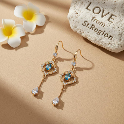Sea Blue Crystal and Cubic Zirconia Goldtone Rhombus Drop Dangle Earrings, gold drop earrings for women, lifestyle look