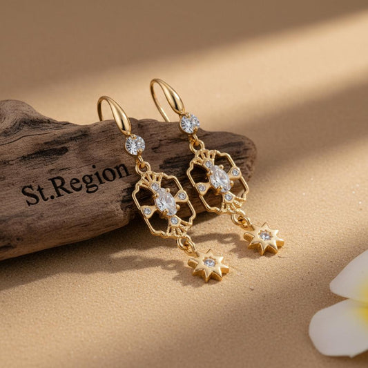 gold tone floral drop earrings St.Region