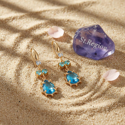 Blue Crystal and Cubic Zirconia Goldtone Teardrop Hook Earrings, gold drop earrings for women, detail close-up