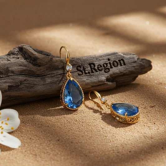 gold tone floral drop earrings St.Region