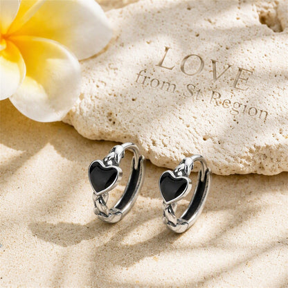 Black Enamel and Silver-Plated Heart Huggie Earrings, silver huggie earrings, dainty minimalist design, lifestyle look