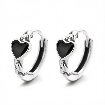 Black Enamel and Silver-Plated Heart Huggie Earrings, silver huggie earrings, dainty minimalist design, side view