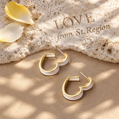 White Enamel and 18K Gold-Plated Heart Huggie Earrings, gold huggie earrings, everyday style, lifestyle look