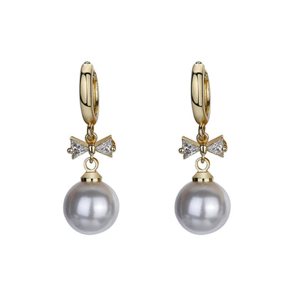 Crystal and Pearl 18K Gold-Plated Bow Huggie Earrings, gold huggie earrings, everyday style, side view