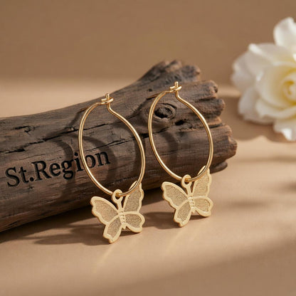 18K Gold-Plated Butterfly Huggie Earrings, gold huggie earrings, dainty minimalist design, front view
