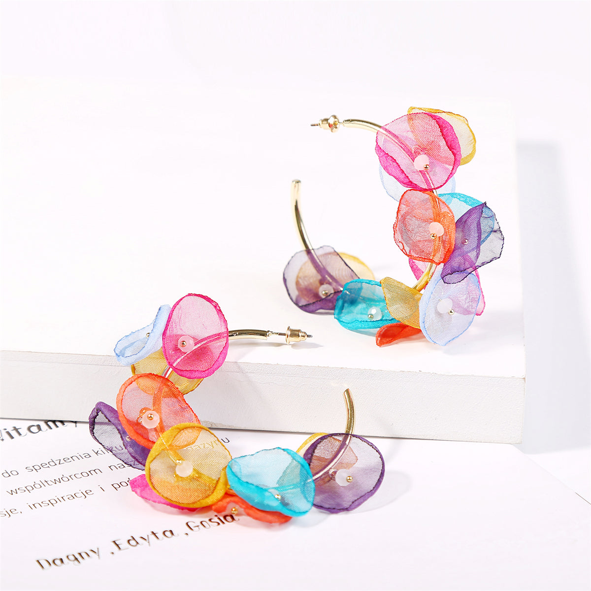 Multicolor flower-shaped earrings crafted from polyester and acrylic, featuring elegant 18K gold-plated hoop design.