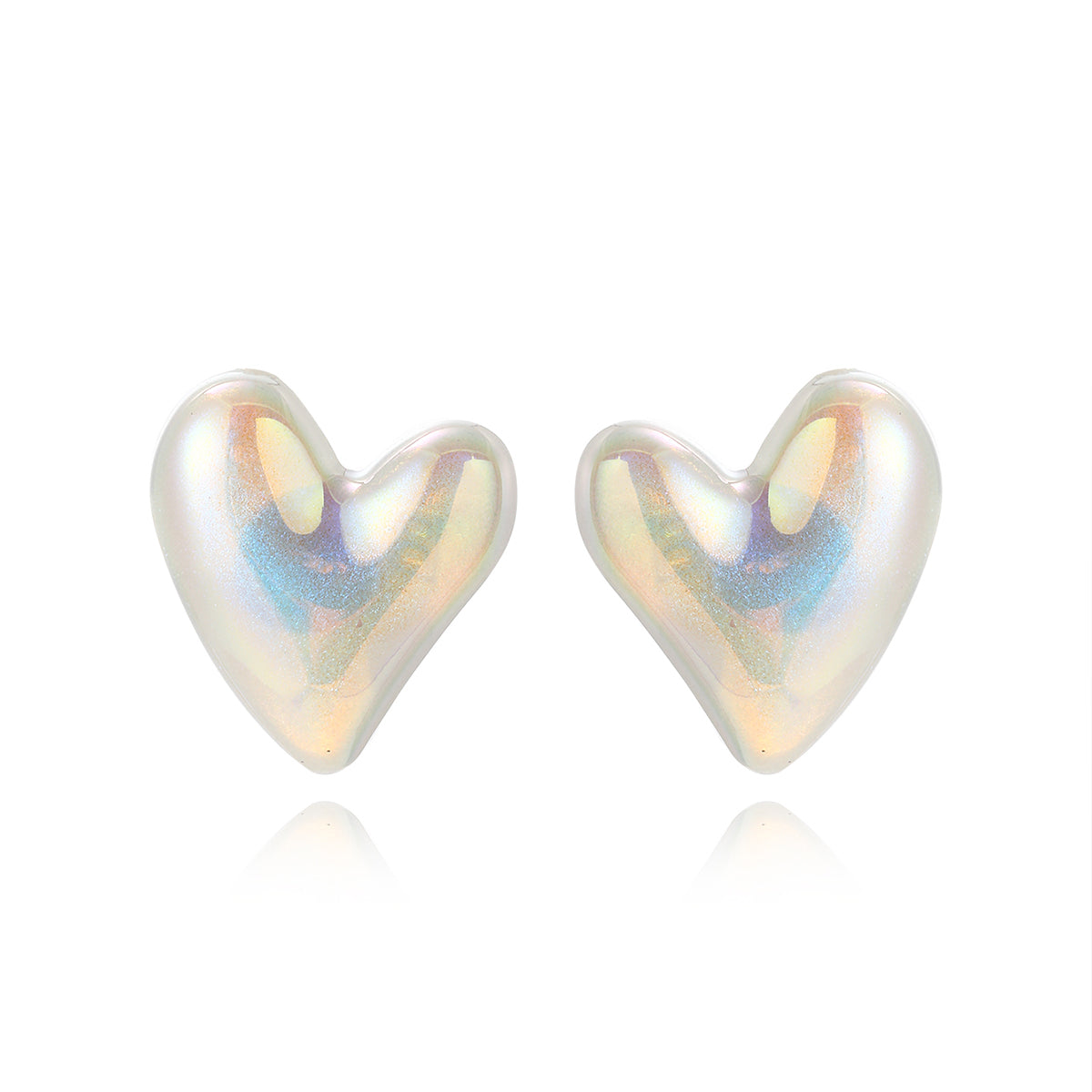Elegant white heart-shaped stud earrings made of pearl and silver plating, showcasing a tilted design for added flair.