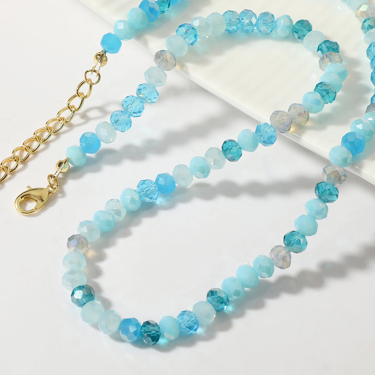 Blue Acrylic and 18K Gold-Plated Beads Chain Necklace, gold pendant necklace for women, detail close-up
