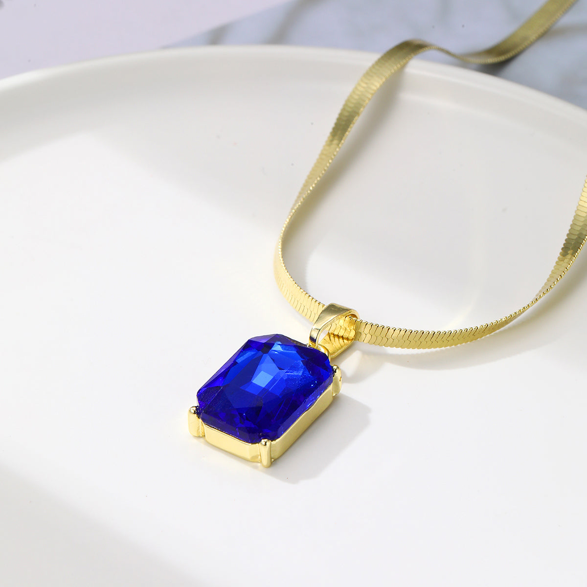 Blue Crystal and 18K Gold-Plated Herringbone Chain Pendant Necklace, gold pendant necklace for women, detail close-up