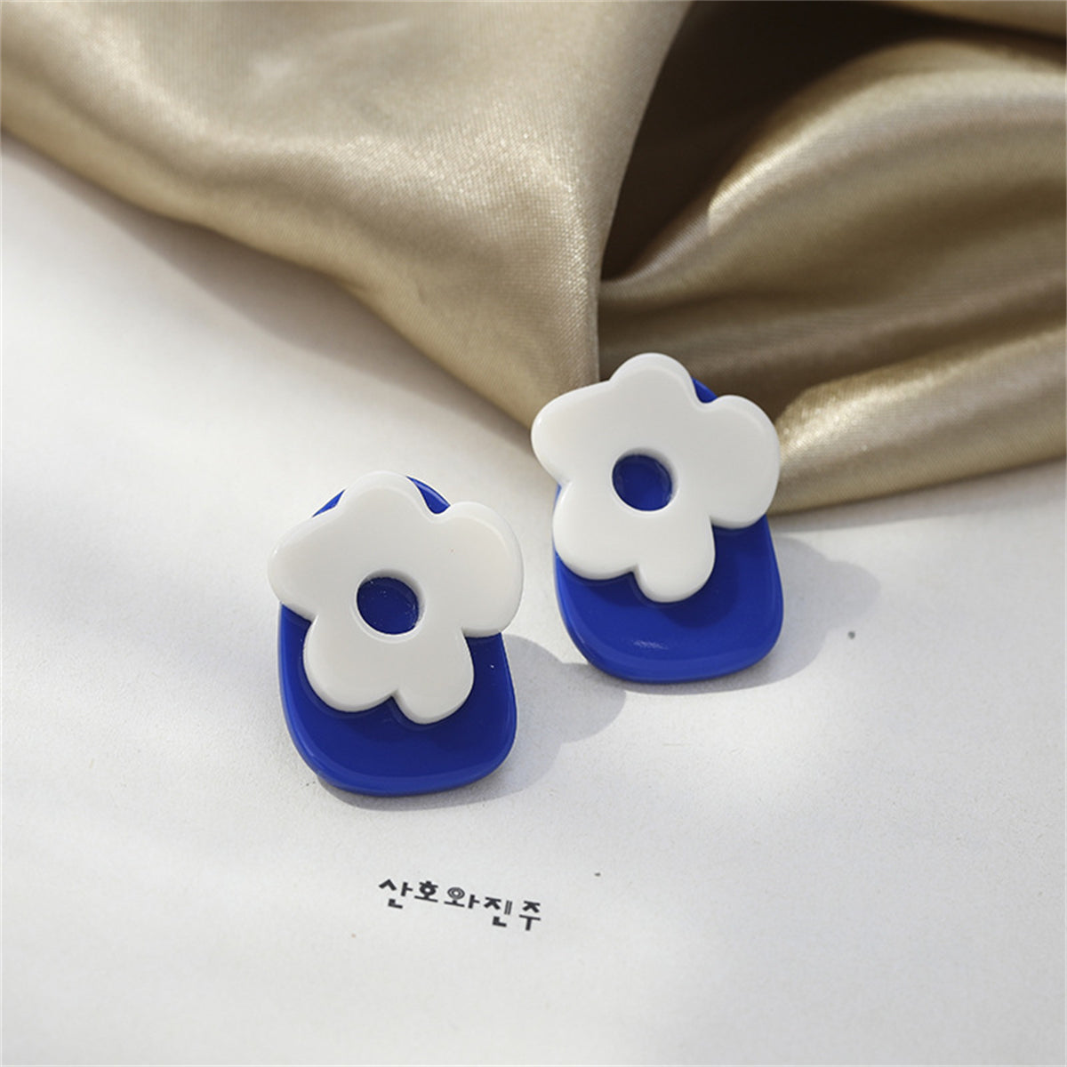 Blue and White Flower Stud Earrings, stud earrings for women, vintage-inspired design, lifestyle look