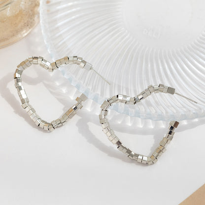 Silver-Plated Heart Hoop Earrings, silver drop earrings for women, botanical inspired, styled look