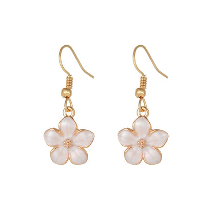 White Enamel and 18K Gold-Plated Flower Drop Earrings, gold drop earrings for women, everyday style, detail close-up