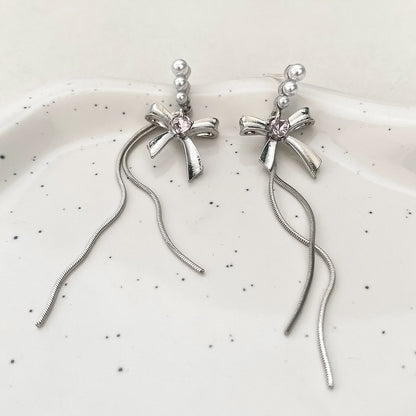 Pearl and Silver-Plated Bow Tassel Drop Earrings, silver drop earrings for women, botanical inspired, detail close-up