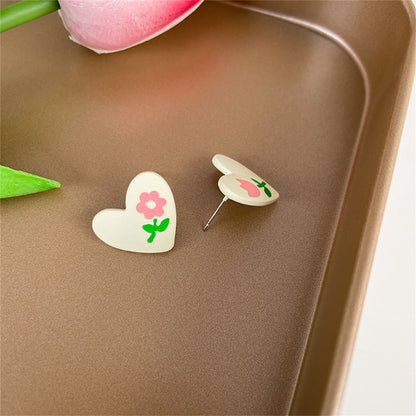 Pink Enamel and Silver-Plated Flower Heart Stud Earrings, silver stud earrings for women, lifestyle look