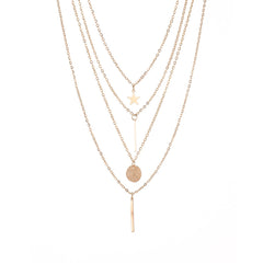 Stunning three-layered gold chain necklace with a coin and cross pendant, crafted in 18K gold plating for a luxurious look.