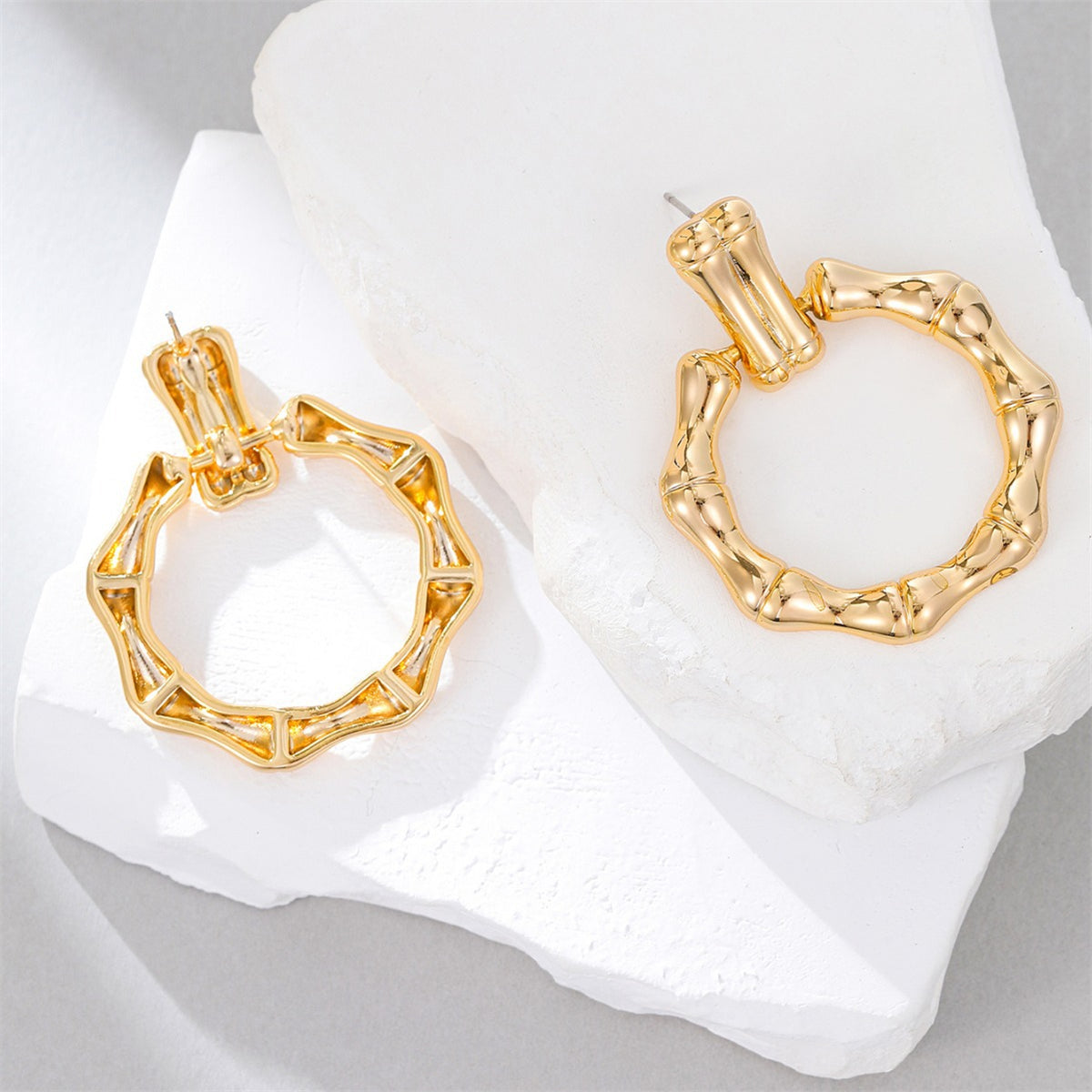 Chic bamboo circle drop earrings in gold-plated frame, crafted from 18K gold plating for a luxurious and fashionable look.