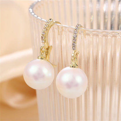 Cubic Zirconia and Pearl Huggie Drop Earrings, huggie earrings, dainty minimalist design, lifestyle look
