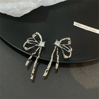 Cubic Zirconia and Silver-Plated Butterfly Stud Earrings, silver stud earrings for women, botanical inspired, detail close-up